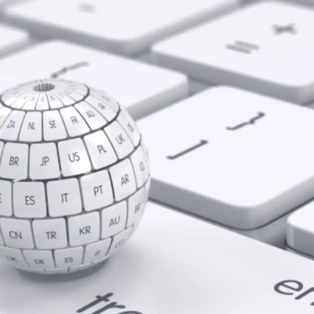 Keyboard with a globe and the word 'translate,' symbolizing biomedical and pharmaceutical translation services for global markets.