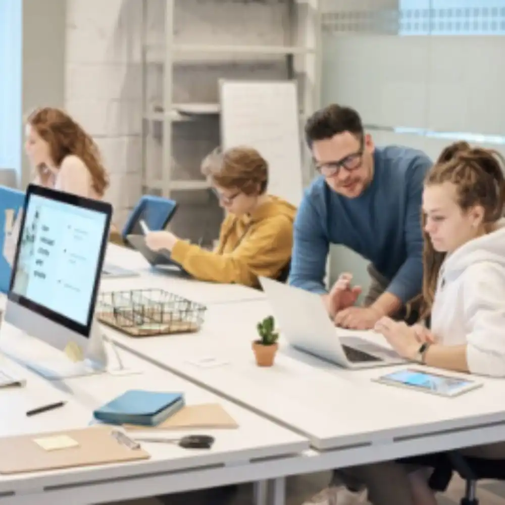 Professional English-Spanish Translation Services with a team working in an office.